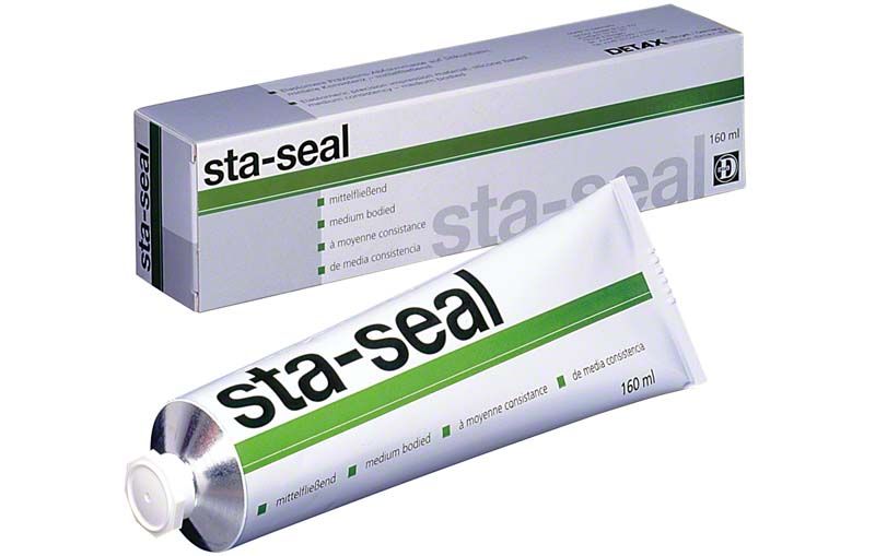Sta-seal Abformmaterial in 160ml Tube und Verpackung von DETAX.