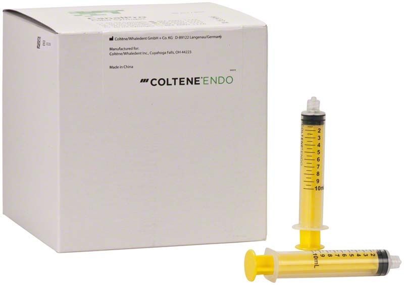 Einmalspritzen CanalPro™ Color 10ml gelb vor Produktverpackung.