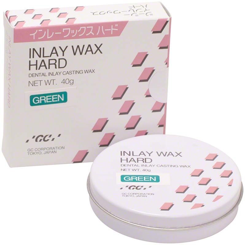 Inlay Wax Hard Green in runder Metallverpackung mit Verpackung im Hintergrund.