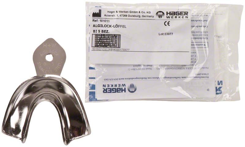 Algilock-Löffel aus Edelstahl mit Verpackung im Hintergrund.