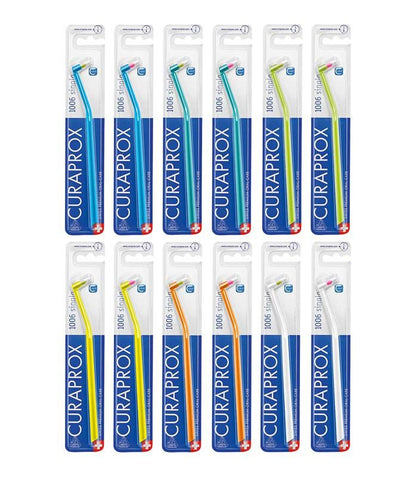 CURAPROX Handzahnbürsten im 12er-Pack in verschiedenen Farben in Blisterverpackung.