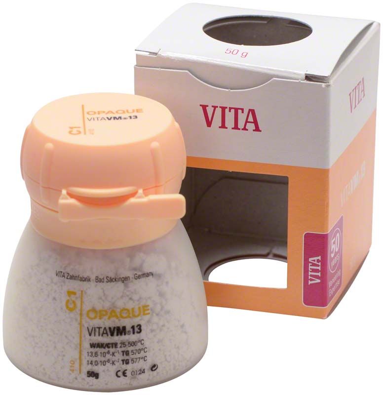 VM13 Opaque 50g C1 in Kunststoffdose mit Verpackung im Hintergrund.