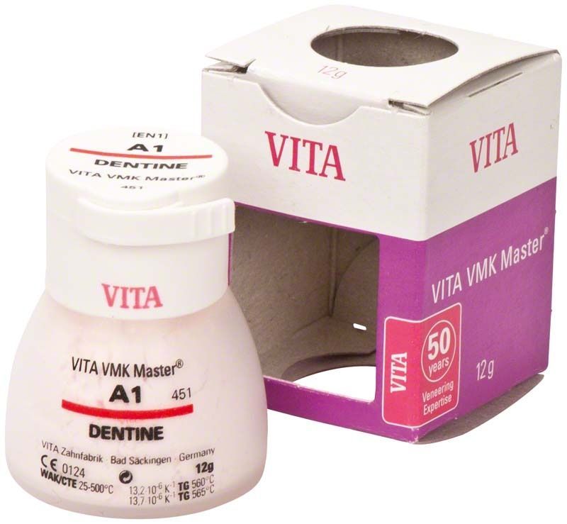 VMK Master Dentine 12g A1 Flasche neben geöffneter Verpackung.