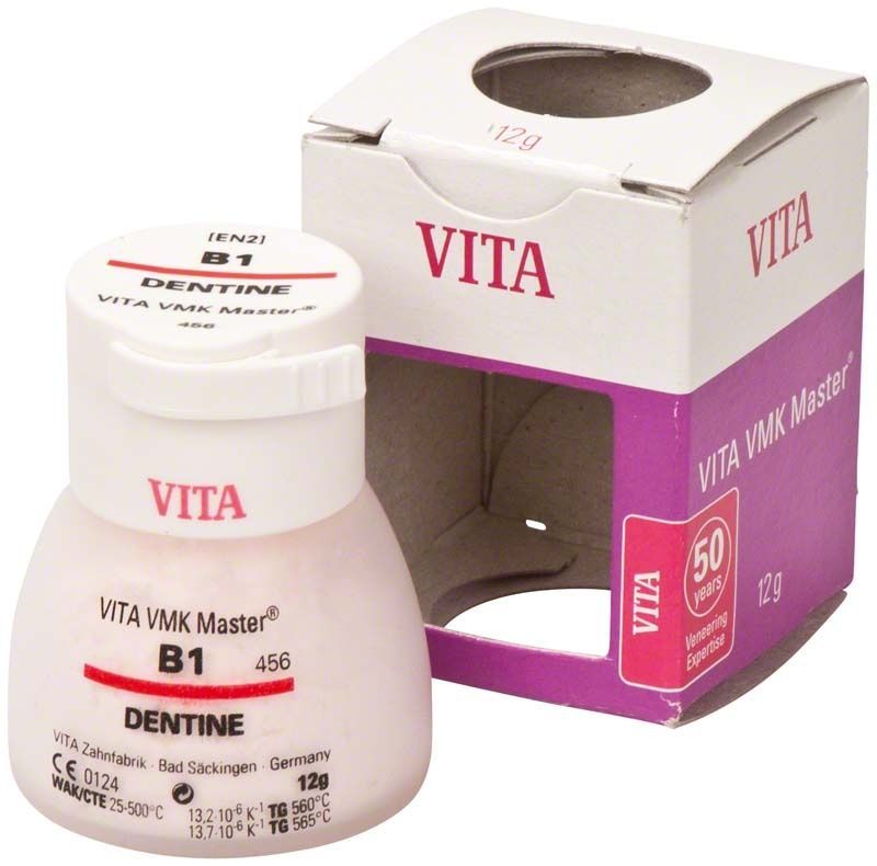 Kunststoffdose mit VMK Master Dentine B1, 12g, neben passender Verpackung.