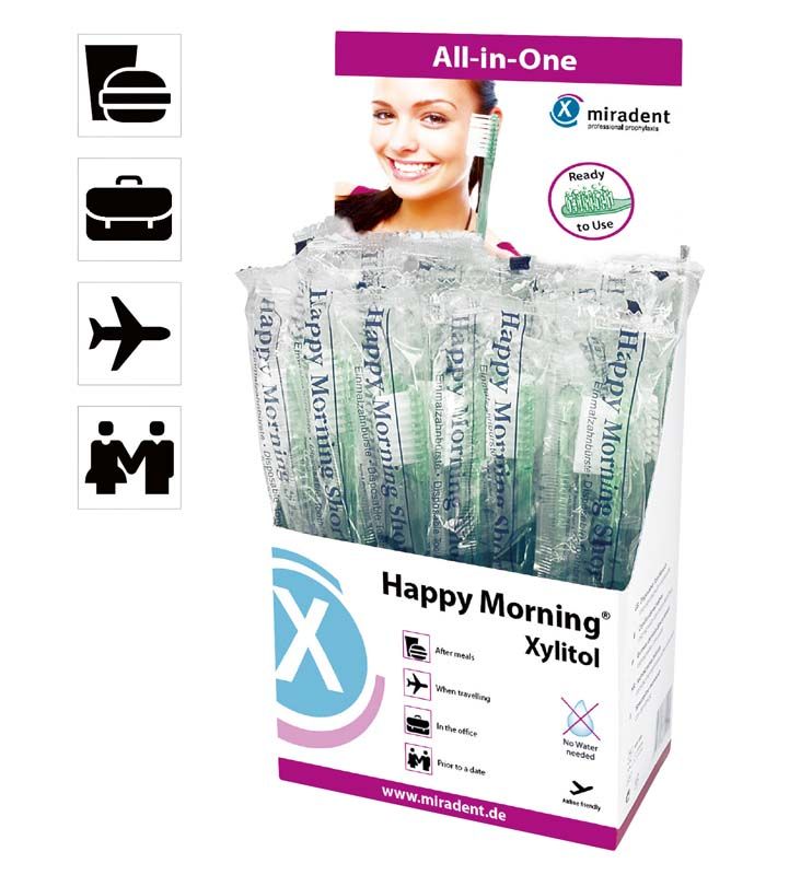 Einzelverpackte Happy Morning® Xylitol Einmalzahnbürsten in einer Aufstellerbox.