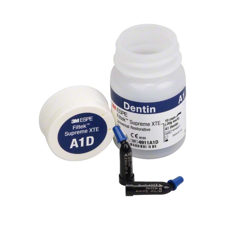 Filtek™ Supreme XTE Dentin Kapseln A1D mit geöffneter Verpackung und Kapseln.