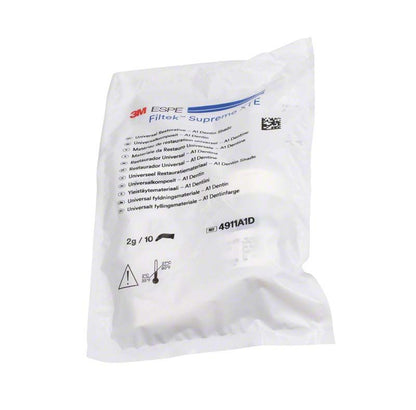 Filtek™ Supreme XTE Dentin Kapseln A1D in versiegelter weißer Verpackung mit Etikett und Symbolen.
