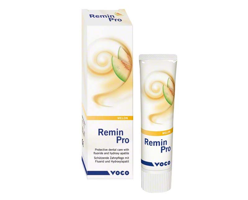 Remin Pro Zahnpasta Melone 40g Tube neben Verpackung mit Produktinformationen.