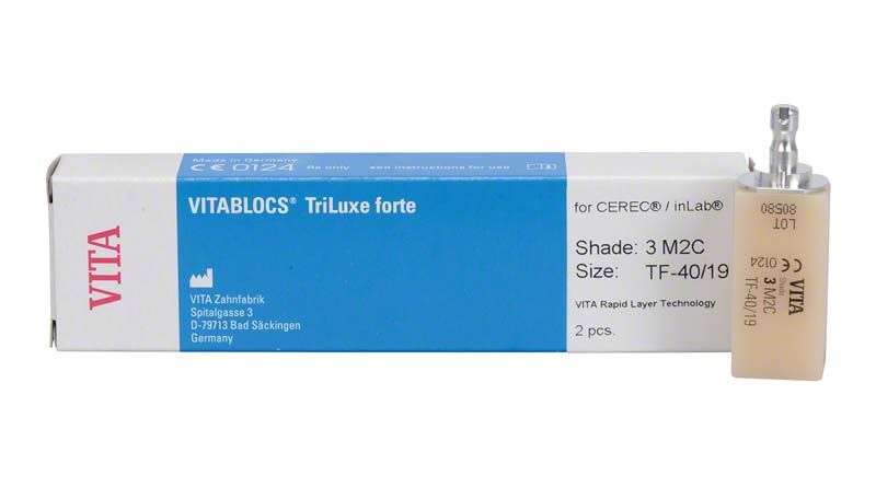 VITABLOCS® TriLuxe forte Zahnblock mit Verpackung in Blau und Weiß.