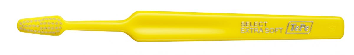 Gelbe TePe Select Zahnbürste Extra-soft mit ergonomischem Griff.