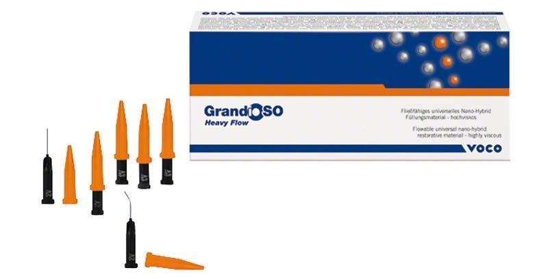 GrandioSO Heavy Flow Caps A2 Verpackung mit orangen Applikationskappen und schwarzen Spritzen.