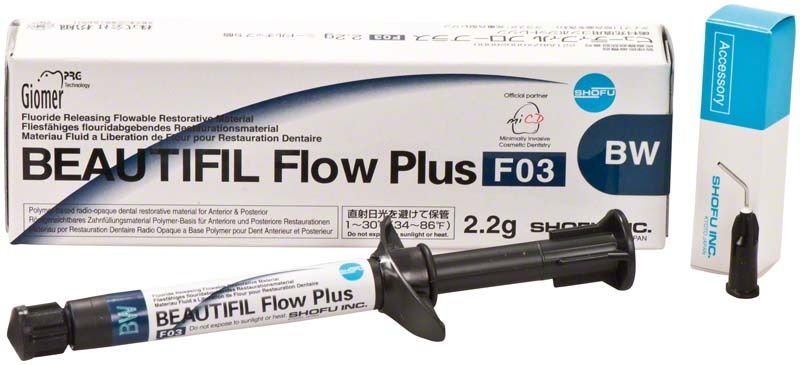 BEAUTIFIL Flow Plus Spritze F03 BW mit Verpackung im Hintergrund.