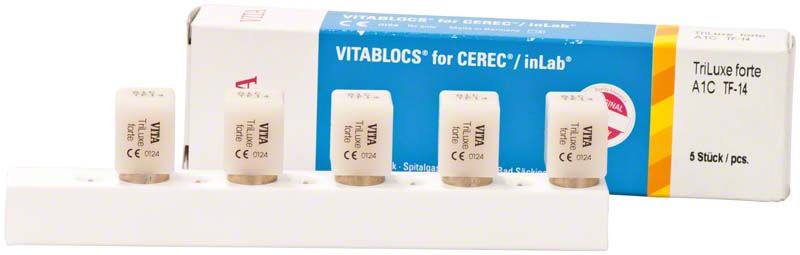 VITABLOCS® TriLuxe forte Dentalblöcke auf weißem Halter vor Verpackung.