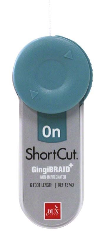 Shortcut nicht imprägnierter Zahnseidenhalter mit blauem Deckel und Etikett.