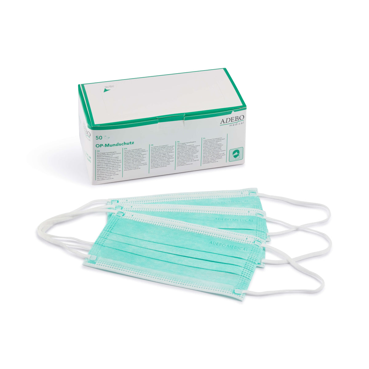 Grüner Mundschutz mit elastischen Bändern und verstellbarem Nasenbügel vor Verpackung.