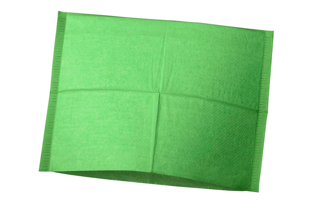 Grüner Kopfstützenüberzug für Zahnarztstühle zur Schutz vor Verschmutzungen.