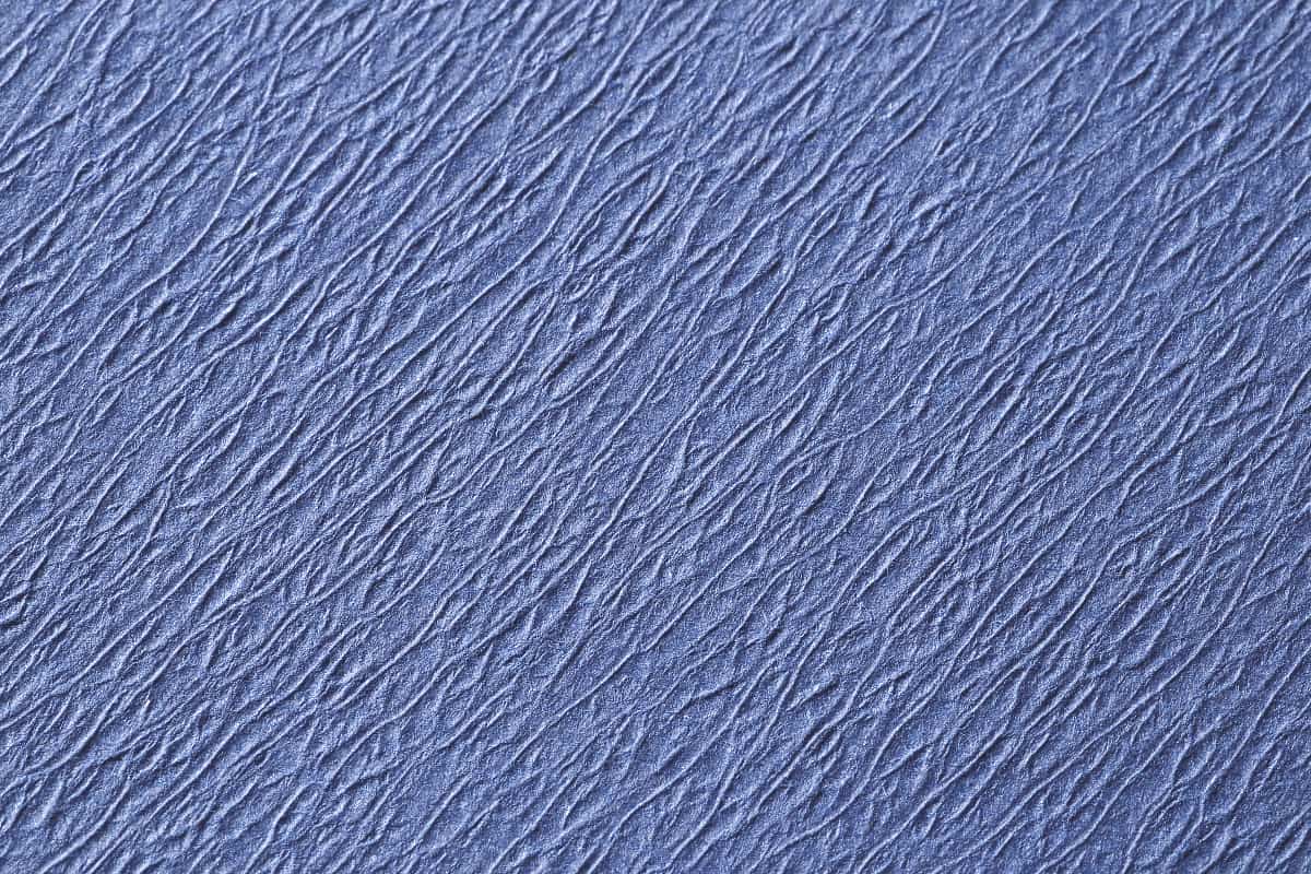 Strukturierte Oberfläche von blauen Zellstoff-Traypapier für Dentalanwendungen.