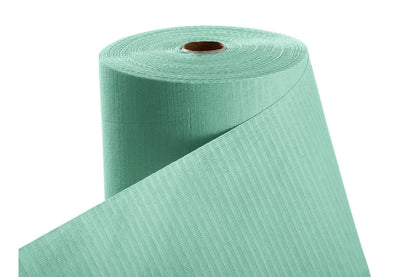 Patientenumhang aus Polyethylen in grün, aufgerollt.