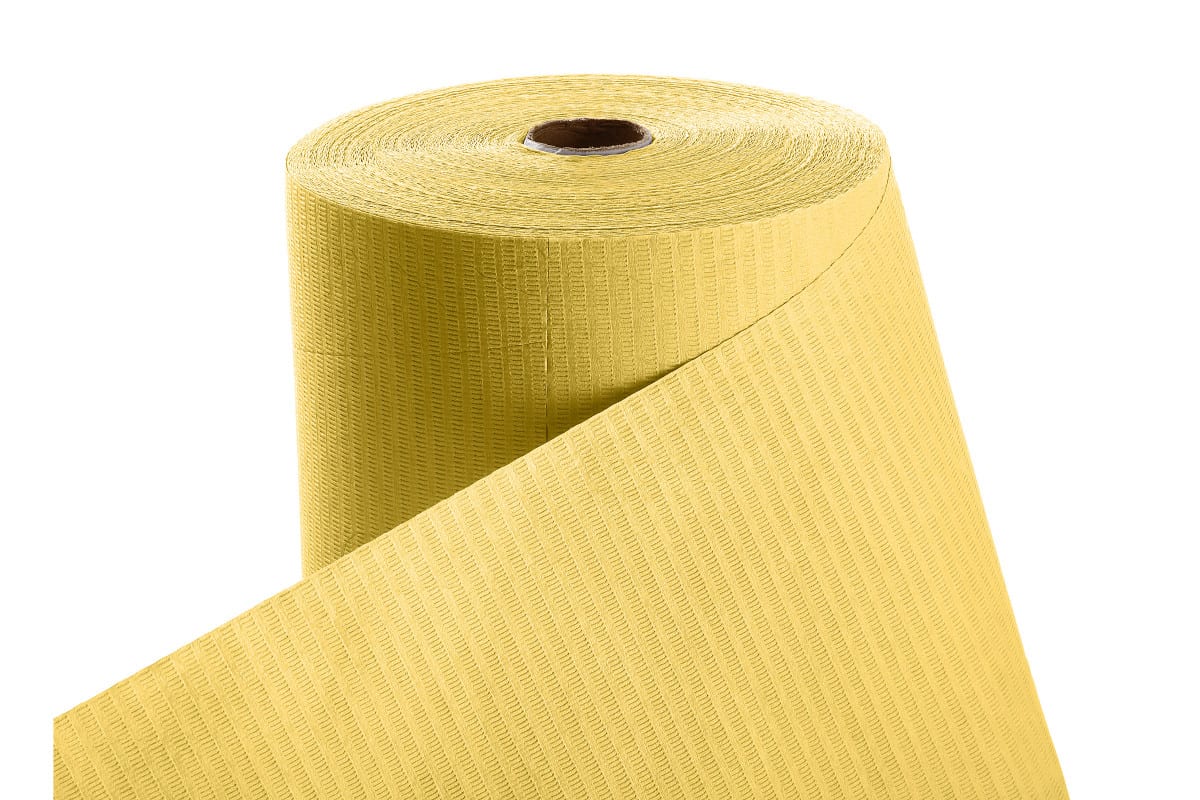 Patientenumhang aus Polyethylen in gelb, aufgerollt.