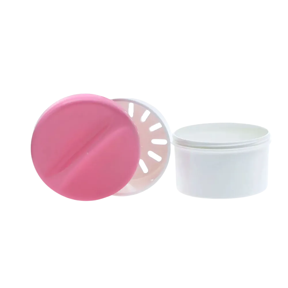 Zahnprothesenbecher in Pink mit Einsatz und abnehmbarem Deckel.